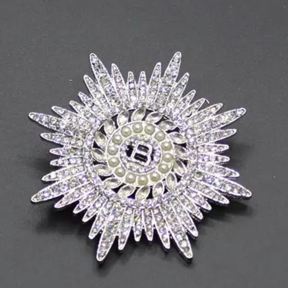 Rhinestone Silver Starburst Brooch